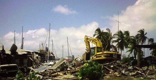 Panama Yacht Club with earth moving machinery destroying the building © SW